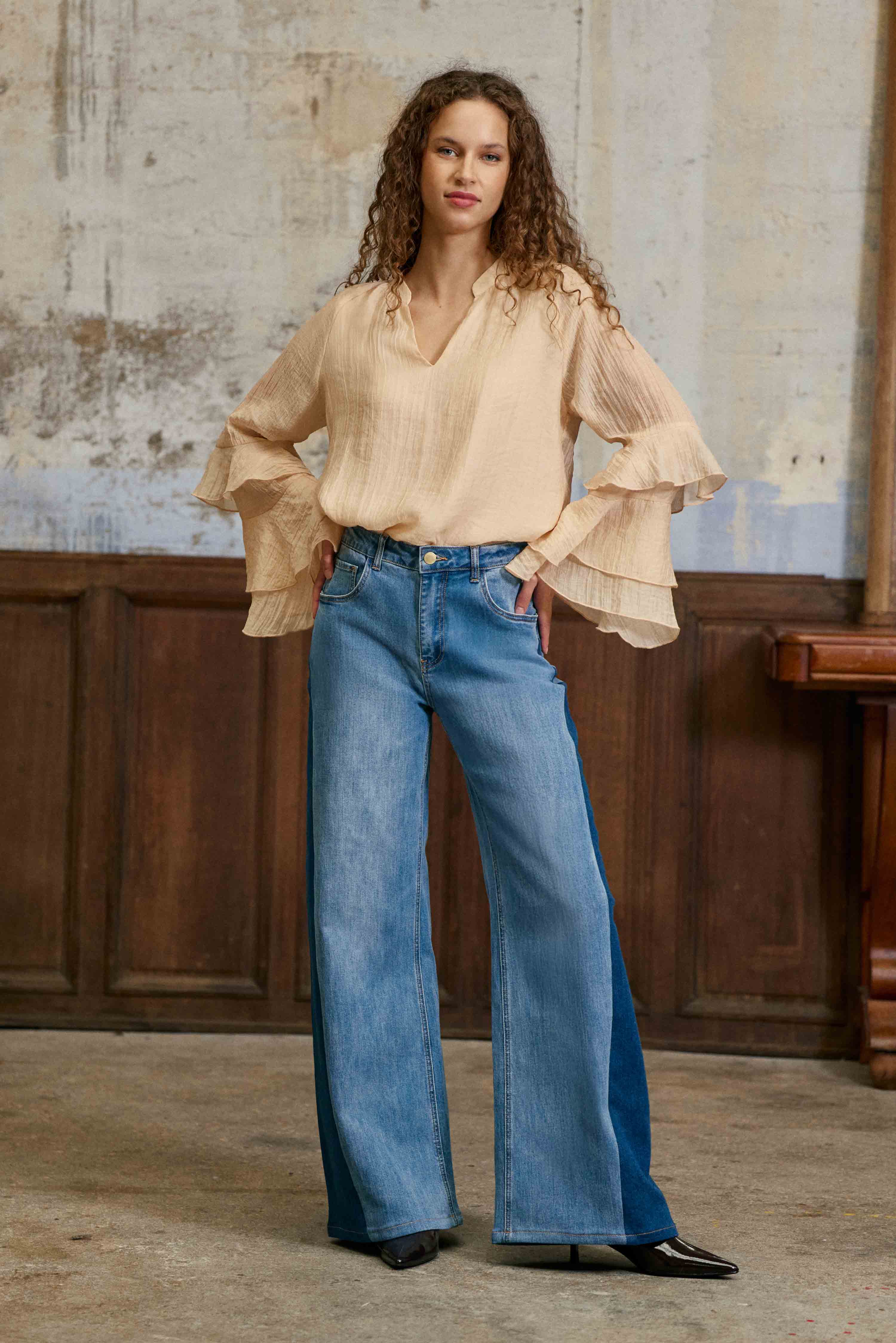 Brieta - Ruffle-sleeved blouse