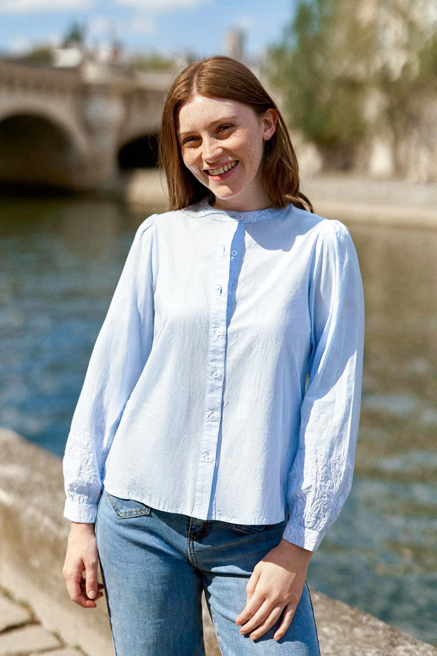 Straight blouse with sky blue embroidered details - Bloy