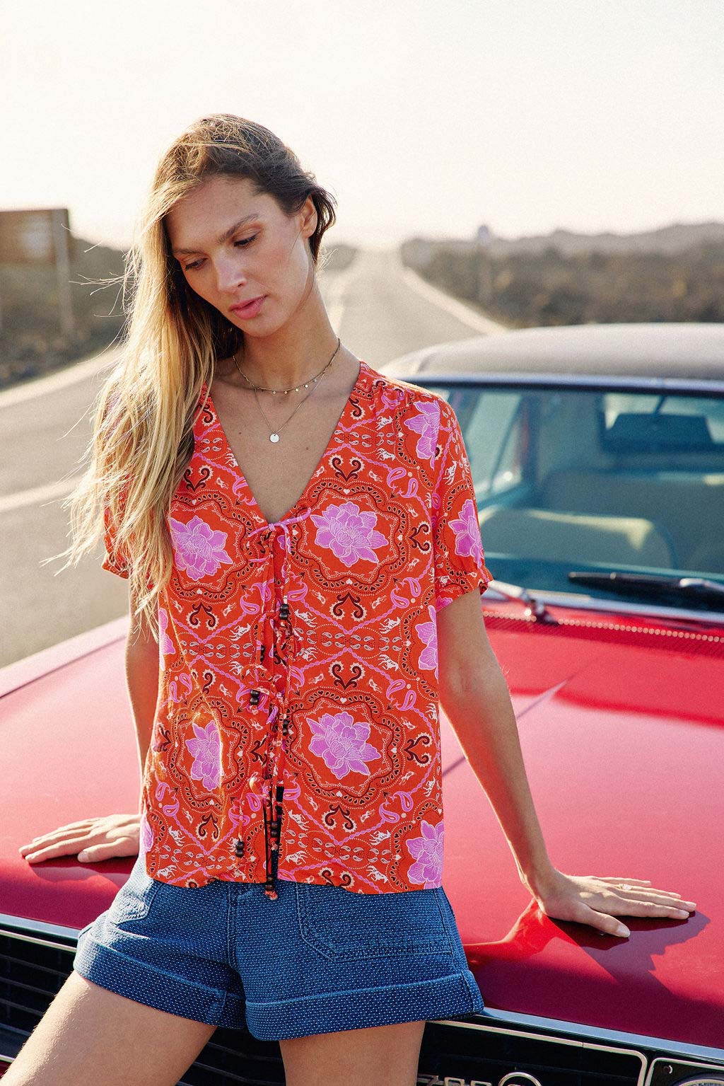 Orange V-neck top - Thuy